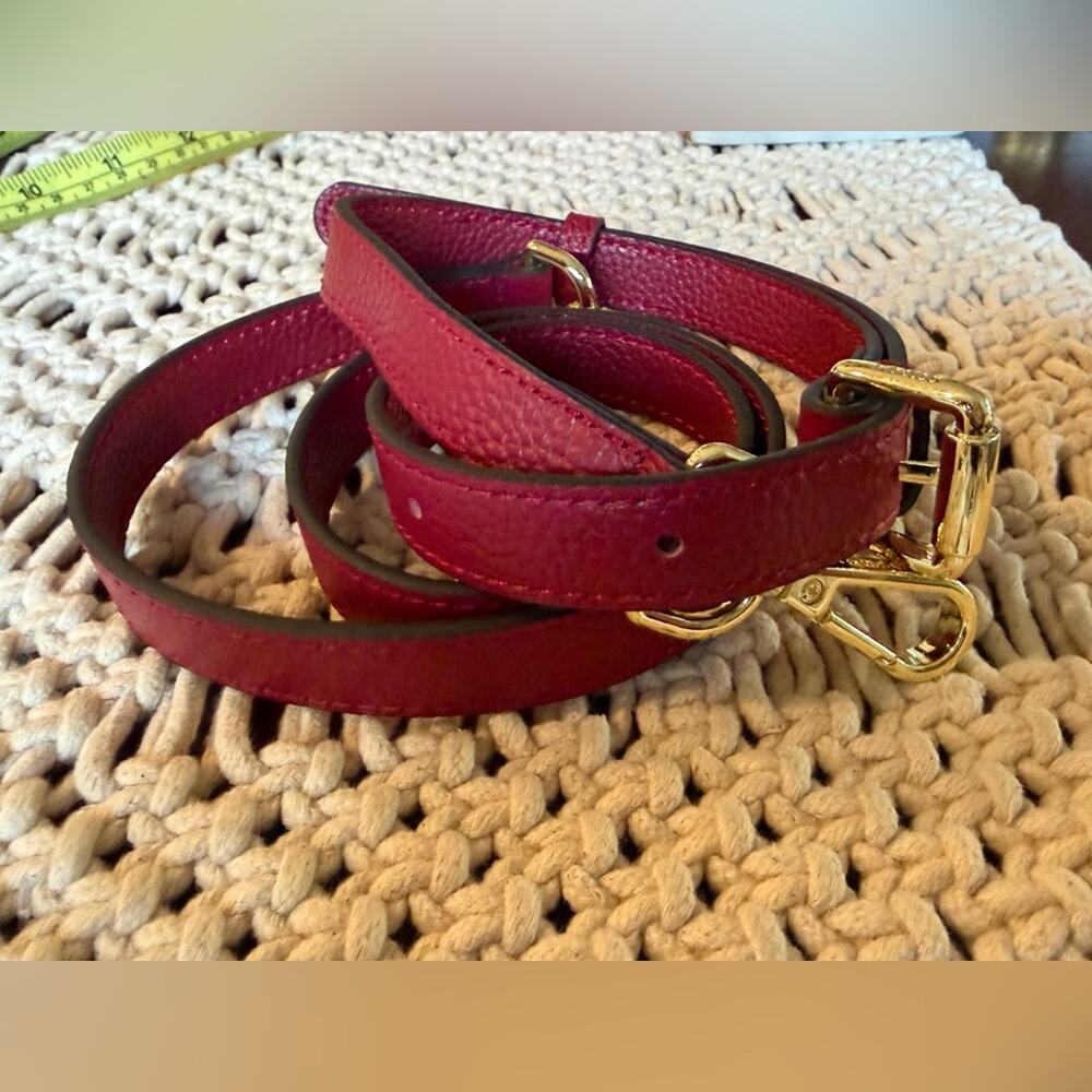 Kattee red leather crossbody purse strap. Gold hardware